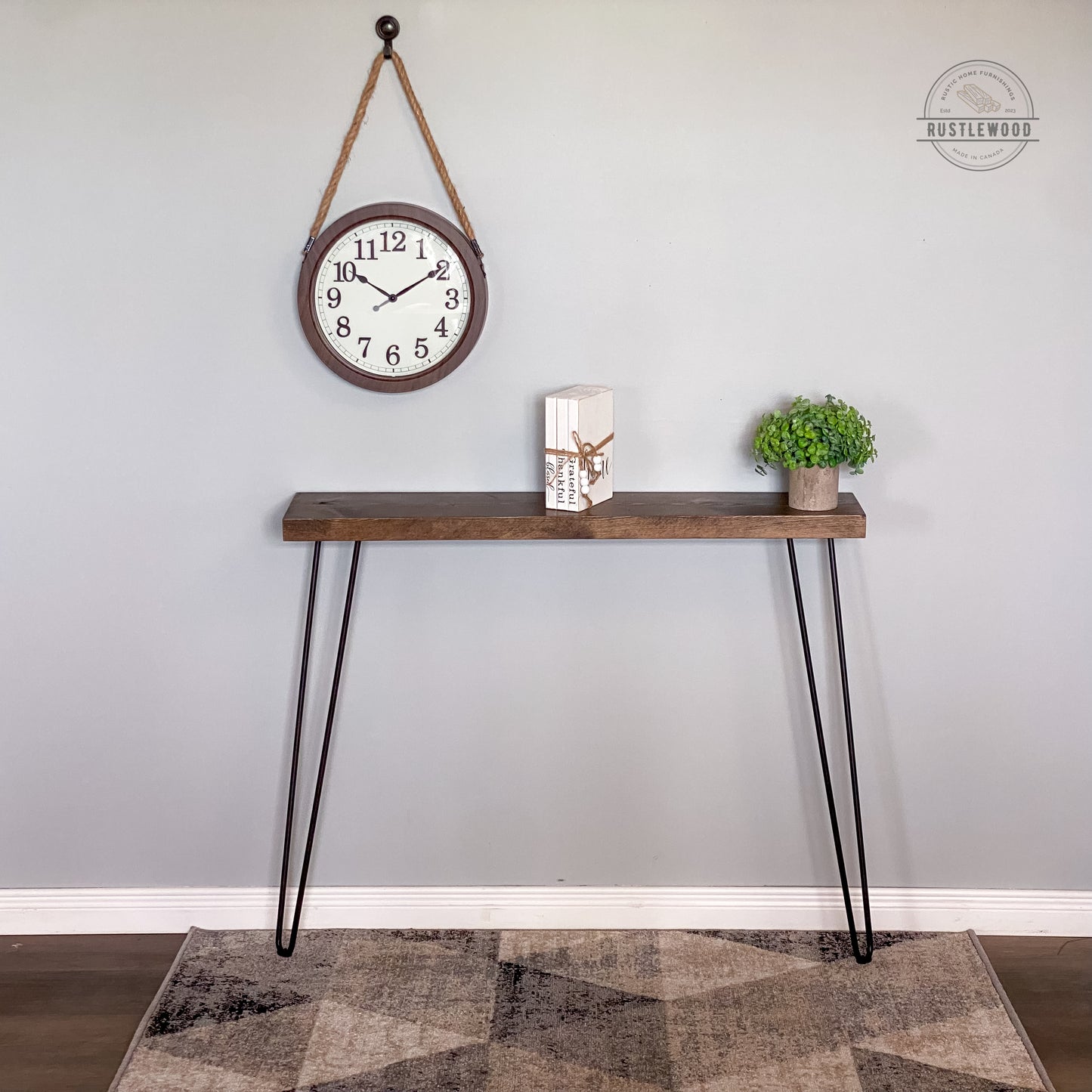 brown narrow console table with hairpin legs